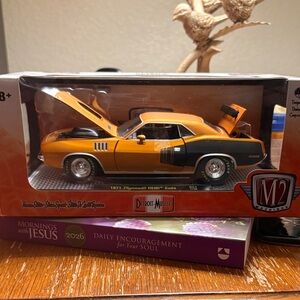 Machine Diecast Car in Vibrant Orange and Black